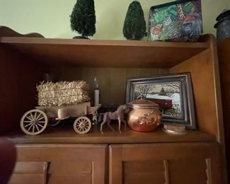 Pair of bookshelves with decorative accessories.
