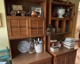 Pair of bookshelves with decorative accessories.