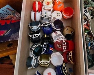 Assorted mini plastic football helmets.