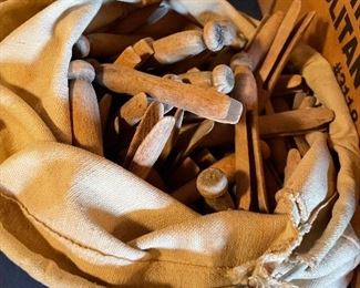 Clothespins in canvas laundry bag.