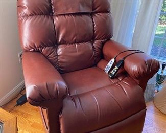 Stand-up electric recliner chair (like new).