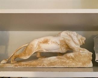 Lion Crouching sculpture.