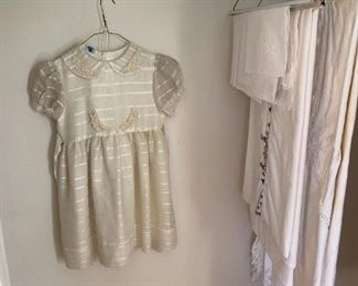 Vintage linens and baby dresses.