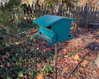 Bird feeder on stand.