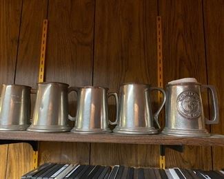 Silverplate beer mugs.