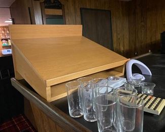 Speaker stand and glassware.