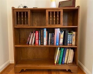 Cabinet and books.