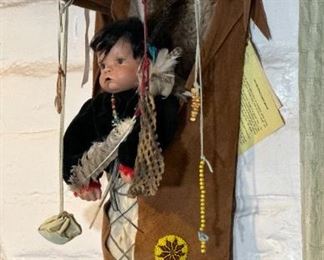 Artist Made Apache Style Cradle Board	33 x 11 x 10.5in	HxWxD
