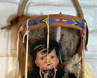 Artist Made Apache Style Cradle Board	33 x 11 x 10.5in	HxWxD
