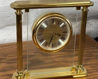 Linden Quartz Gold Tone Mantle Desk Clock Roman Numerals	7.5 x 7.5 x 2in	HxWxD

