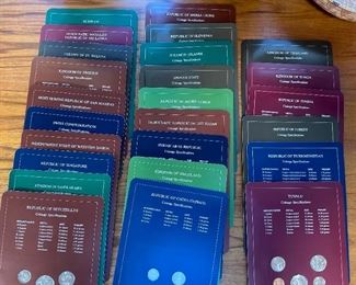 Franklin Mint Coin Sets of All Nations 4 volumes + book of sheets	1 book: 13x4.5x8.75in	
