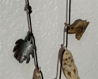 Carved Bone Tribal Necklace	16 inches size	

