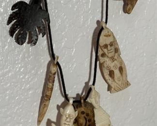 Carved Bone Tribal Necklace	16 inches size	
