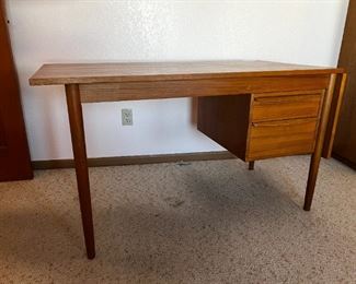Danish Modern Teak Desk G.V. Gasvig Desk	Table top dimensions without Leaf 48 in x 24 in. With Leaf 64 in x 24 in desk, height, 28.25 inches, 49.25 inches long 24.25 inches deep.	
