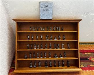 Franklin Mint Fighting Men of America Pewter Figurines w/ wooden wall display Lot of 50	Average figure height 2 inches 50 figures wooden shelf measurements 15 in x 20 in	

