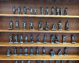 Franklin Mint Fighting Men of America Pewter Figurines w/ wooden wall display Lot of 50	Average figure height 2 inches 50 figures wooden shelf measurements 15 in x 20 in	
