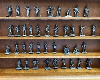 Franklin Mint Fighting Men of America Pewter Figurines w/ wooden wall display Lot of 50	Average figure height 2 inches 50 figures wooden shelf measurements 15 in x 20 in	
