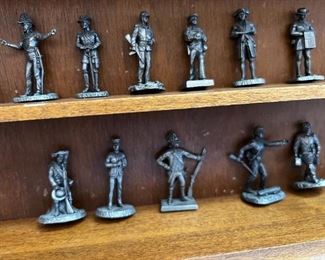 Franklin Mint Fighting Men of America Pewter Figurines w/ wooden wall display Lot of 50	Average figure height 2 inches 50 figures wooden shelf measurements 15 in x 20 in	
