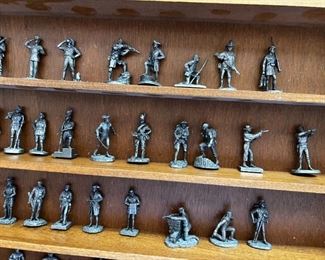 Franklin Mint Fighting Men of America Pewter Figurines w/ wooden wall display Lot of 50	Average figure height 2 inches 50 figures wooden shelf measurements 15 in x 20 in	
