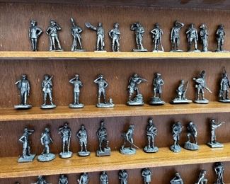 Franklin Mint Fighting Men of America Pewter Figurines w/ wooden wall display Lot of 50	Average figure height 2 inches 50 figures wooden shelf measurements 15 in x 20 in	
