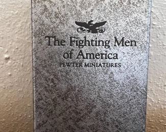 Franklin Mint Fighting Men of America Pewter Figurines w/ wooden wall display Lot of 50	Average figure height 2 inches 50 figures wooden shelf measurements 15 in x 20 in	
