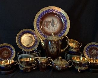 Eschbenbach Napoleon Tea Set
This is a twelve set tea set depicting various scenes. See pictures for details. Shipping is available but the handling fees will reflect the very fragile nature of this lot.