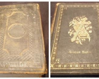 1853 Holy Bible & 1897 German Hymn Book
This lot includes two antique books. The first one is a Holy Bible containing the Old and New Testaments marked 1853 on the first page. The other book is a German hymn book marked 1897.

Smallest 4½w x 6½h x 1d

Largest 4½w x 7h x 2d