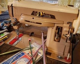 Singer Sewing machine with cabinet