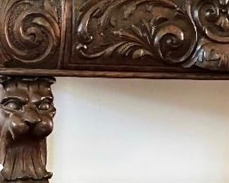 Carved apron header of console