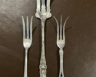 Lemon and lettuce antique forks in sterling