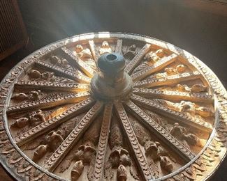 An 18th C Tibetan wagon wheel converted to a table