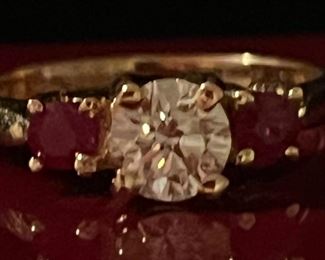 .64 C center stone and bright rubies…I/VVS1
$1875 FIRM