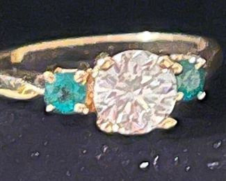 .75 center stone F/VVS1…fabulous stone with emeralds 
$3650 FIRM