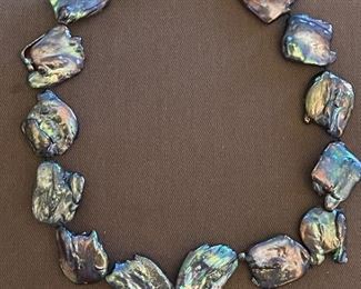  Black mother of pearl necklace 
$200 FIRM