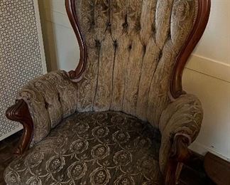 Antique mahogany carved parlor chair with antique cut velvet