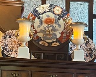 Antique Imari and a gorgeous pair of lit porcelain urns with gilded handles.