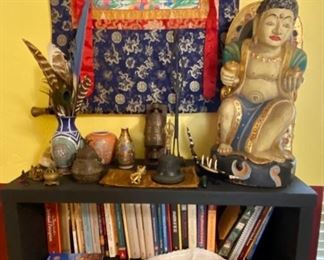 Wooden Painted Deity of Wealth, small buddhist figurines, Buddhist metal bell, wall hanging, vintage placemats and more.