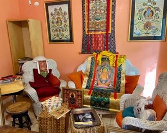 Large Buddhist Thangka hanging in the center of the wall is sold- one one the sofa is still available.