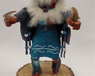 KACHINA DANCER DOLL TITLED 'HOTOTO'. SIGNED V. CLEVELAND. 11.5" TALL TO THE TIP OF THE FEATHERS, EXCLUDES BASE