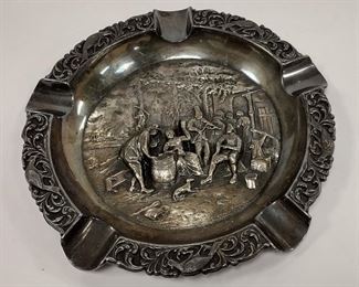 DUTCH SILVER PLATED HIGH RELIEF CIGAR ASHTRAY - COURT YARD GATHERING SCENE. 8" WIDE. HALLMARKED AND STAMPED 'EPNS HOLLAND