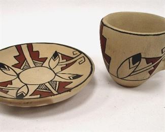 PUEBLO NATIVE AMERICAN POTTERY SMALL CUP AND SAUCER WITH FEATHER DESIGN.