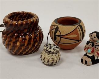 NATIVE AMERICAN MINIATURES: 1/2" TALL NAVAJO HORSE HAIR, PUEBLO ARTIST SIGNED 1" TALL JAR, MODEL OF A PITCH COVERED WATER BASKET AND A MEXICAN 1" TALL STORYTELLER 