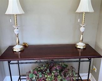Charleston Forge Sofa/ ROMAN Console Table with two Lenox Buffet Lamps and a floral sprat.