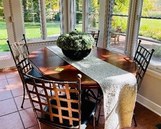 This is an amazing dinette set with an etagere in the background.  The Oval Table is Nichols & Stone and the 4 Chairs are Charleston Forge.
