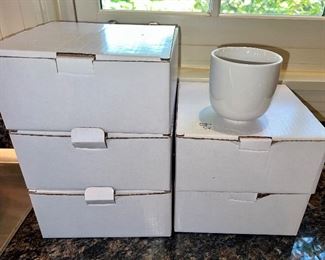 These boxes hold Crate & Barrel mugs, as shown.  They are the perfect weight and feel in your hand.  Nice to have these for a party or special occasion.