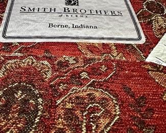 Super nice Smith Brothers of Berne IN chair and ottoman.  I'd like to sit and put my feet up and read one of the hundreds of interesting books in this home!