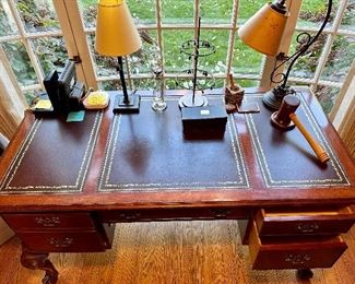 Hekman Executive Desk with Leather Inserts on the Top.  Left File Drawer, Center Keyboard Drawer and 2 Drawers on Right.  Ball and Claw Feet 