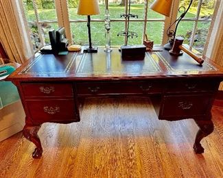 Hekman Executive Desk with Leather Inserts on the Top.  Left File Drawer, Center Keyboard Drawer and 2 Drawers on Right.  Ball and Claw Feet 