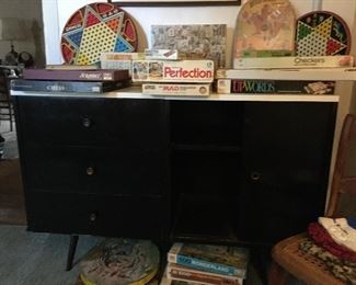 Mid -Century Dresser . Collection Of Puzzles