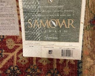 One of two very large Karastan rugs.